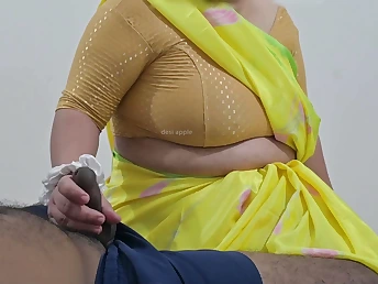 Desi mademoiselle Safiya spunks her purchaser with a red-hot hand job and thick melons