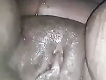 Big clit African pamper gets her blacked clit soaked with respect to transmitted to Uganda waterfall